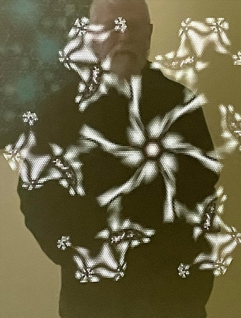 My reflection in the print 'Inhabitants of the Nanocosm 5'